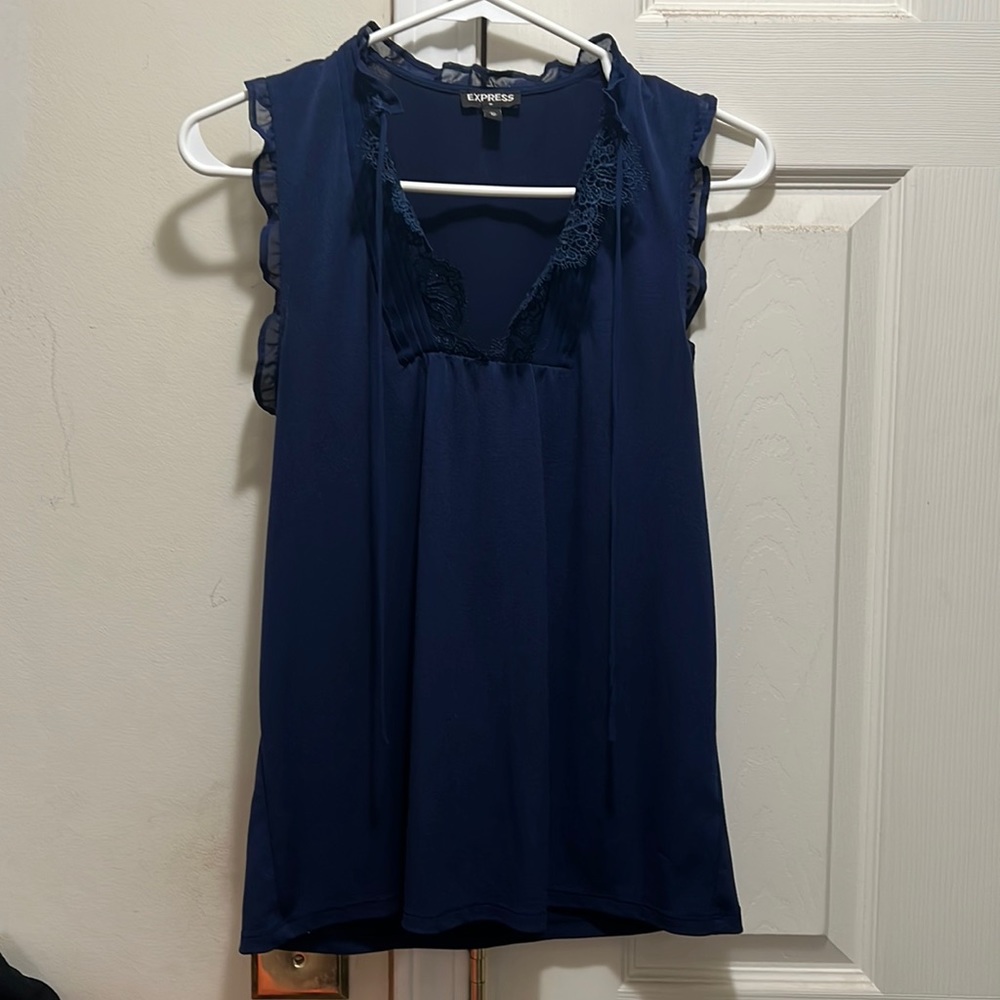 Express sleeveless blouse with lace trim. XS